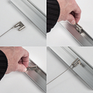 Inserting hook into the Traditional Art Hanging Wall Track