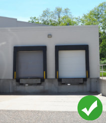 Two loading docks with green check mark