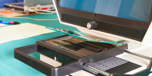 microfiche machine on desk